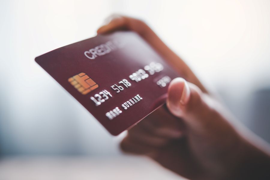 Close up hands holding a credit card
