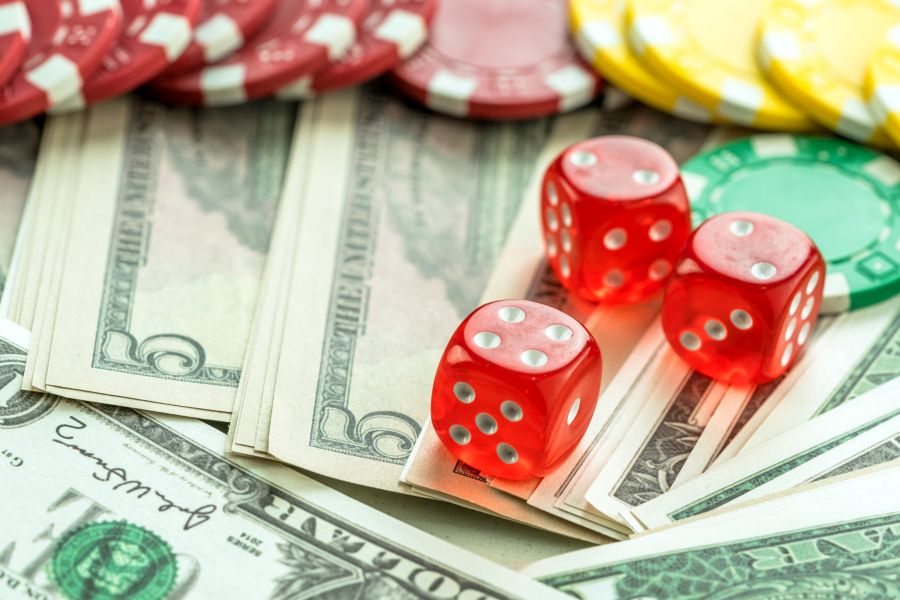 Poker Chips and Dice on a Table